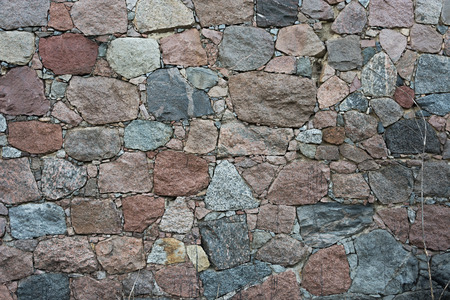 Pattern gray color of modern style design decorative uneven cracked real stone wall surface with cementの写真素材