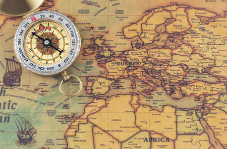 Vintage world map with compass. Travel and history concept. Trade routes.