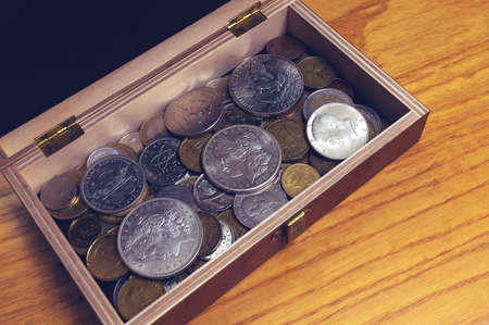 Box with old US coins insideの写真素材