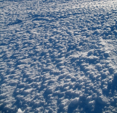 Snow surface  The surface is covered by a considerable quantity of snow clods  Can be used designers as a background  の写真素材
