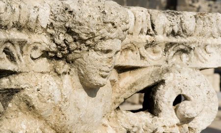 ruined bas-relief in ancient city of beit shean, israelの写真素材
