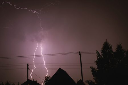 summer shines bright lightning in the skyの写真素材
