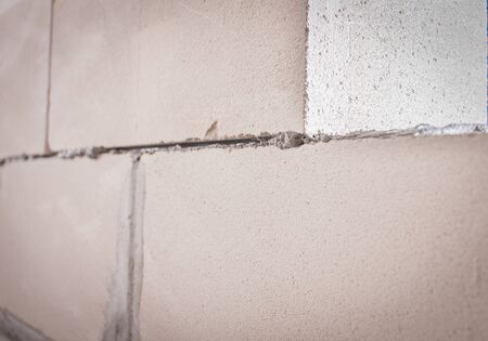 Wall, masonry of several aerated concrete blocks. / Brick, aerated concrete block.