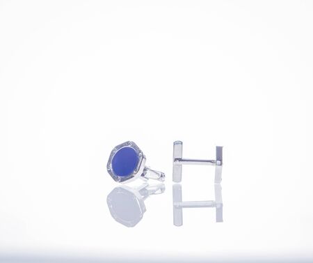 Cufflinks on a whiteの写真素材