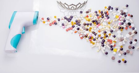 The flu virus epidemic. Human life and death from the virus. The inscription of tablets and a thermometer on a gray background, Flat Lay, place for text, Copy spaceの写真素材