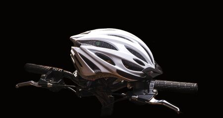 bicycle helmet on a black backgroundの写真素材
