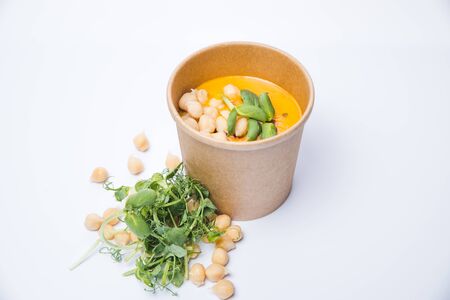 broccoli spinach cream soup on rustic wooden backgroundの写真素材