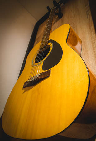 Beautifully designed bedroom with organized clothesの写真素材