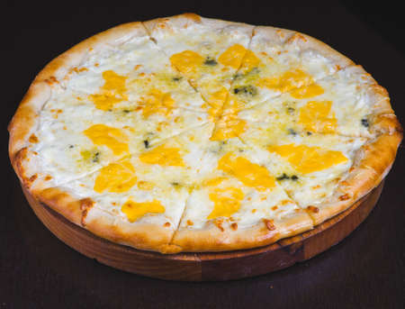 Pizza Carbonara with bacon cheese and eggの写真素材