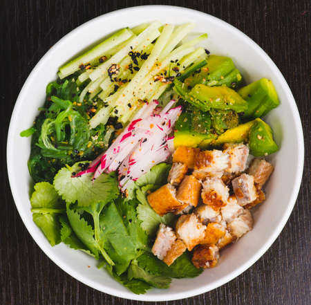 Japanese Cuisine - Chuka Seaweed and Unagi smoked eel Salad with Nuts Sauce. Topped with Eel Sauce and Sesameの写真素材