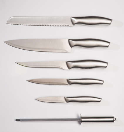 Set of steel kitchen knives, isolated on white background with clipping path. chef knife.の写真素材