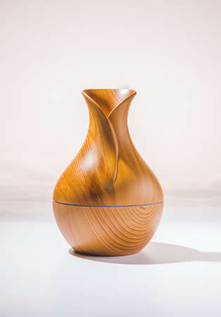 The brown humidifier for moistening of dry air isolated on white background.の写真素材