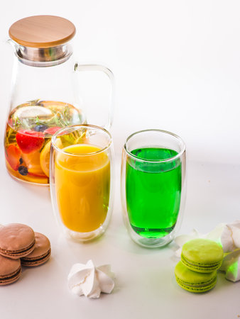 Lemonade or cocktail rhubarb, strawberry, mint, lemon and ice on light blue background. vertical formatの写真素材