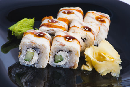 Traditional Japanese rolls with salmon and smoked eel in boxの写真素材