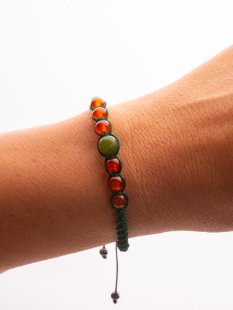 Collection of crystal gemstones bracelets on the table.の写真素材