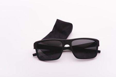 Vintage sunglasses with black plastic frame on white backgroundの写真素材