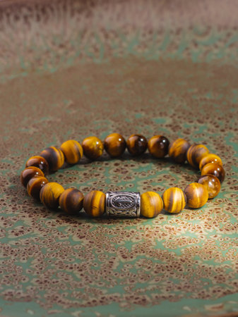 Black Obsidian stone bracelet, Chinese men's modern retro style fashion. Isolated on white backgroundの写真素材