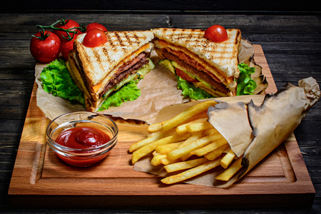 Healthy tuna panini sandwiches with french fries.の写真素材