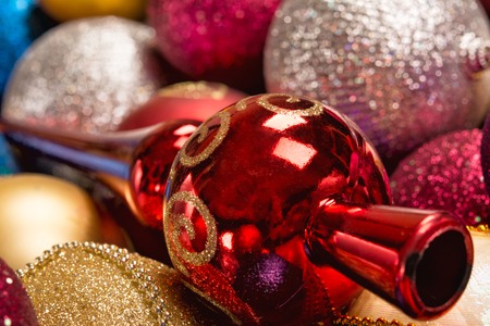 Beautiful bright New Years toys of different colors close-upの写真素材