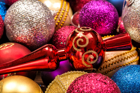 Beautiful bright New Years toys of different colors close-upの写真素材