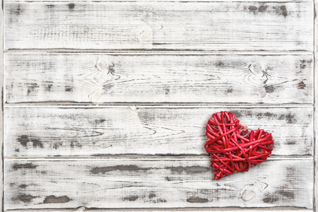 One big red heart on the background of wooden boards, Valentines day, the holiday of loveの写真素材