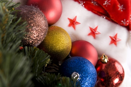 christmas tree, balls and red santa hatの写真素材