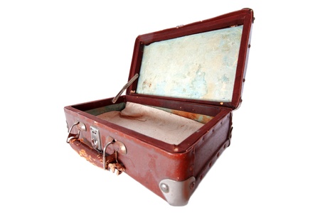 dusty open brown leather suitcase isolated on whiteの写真素材