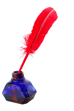 Antique red pen and inkwell isolated on white
の写真素材