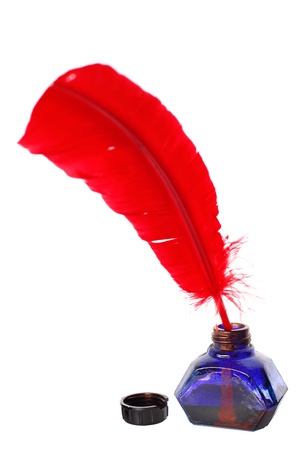 Antique red pen and inkwell isolated on white
の写真素材