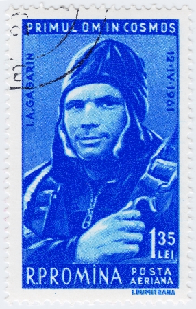 ROMANIA - CIRCA 1961   stamp printed in Romania shows russian astronaut Yuri Gagarin first human in space, circa 1961のeditorial素材