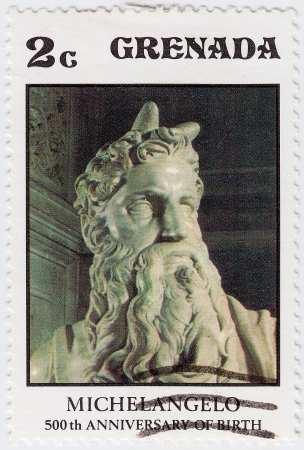 GRENADA - CIRCA 1975 : stamp printed in Grenada dedicated artist Michelangelo di Lodovico Buonarroti Simoni 500th Anniversary of birth, circa 1975のeditorial素材