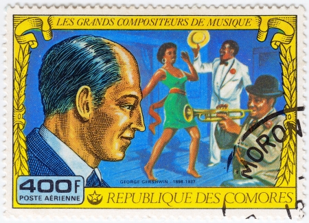 COMORES - CIRCA 1977  stamp printed in Comores shows George Gershwin great  American composer and pianist, circa 1977のeditorial素材
