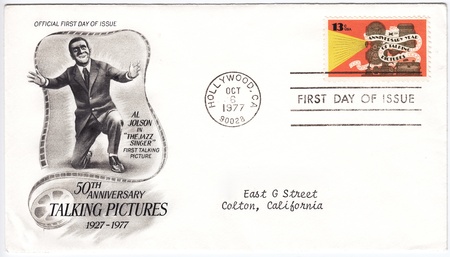 USA - CIRCA 1977: Envelope and stamp printed in USA of 50th Anniversary Year of Talking Pictures with Al Jolson in The Jazz Singer film, circa 1977の写真素材