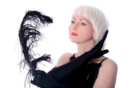 lovely woman in retro style with black feather isolated on white