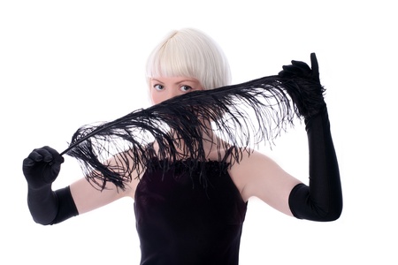 lovely woman hiding face of black feather isolated on white