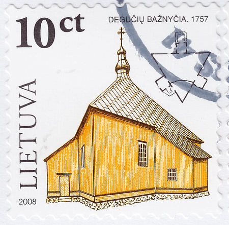 LITHUANIA - CIRCA 2008 : stamp printed in Lithuania shows chirch Deguciu  Baznycia, circa 2008 の写真素材