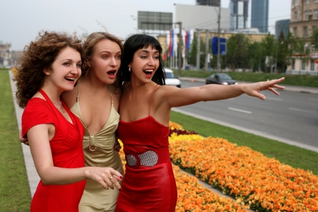 surprise - 3 funny friends outdoorsの写真素材