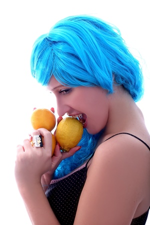 blue hairs girl with lemonsの写真素材