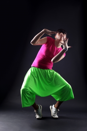 woman modern dancer against blackの写真素材