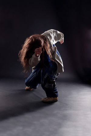 cool dancer against black backgroundの写真素材