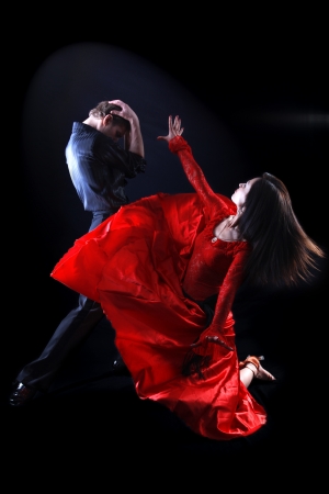 dancer in action against black backgroundの写真素材