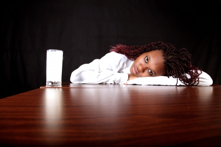 milk and afro american womanの写真素材