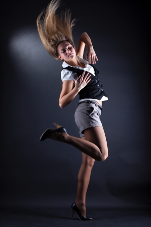 woman modern dancer against black backgroundの写真素材