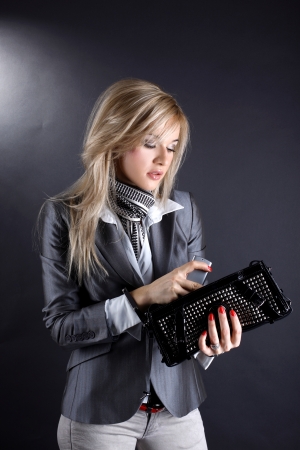 fashion young woman with clutch bagの写真素材