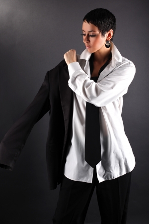 woman with white shirt dressing coatの写真素材
