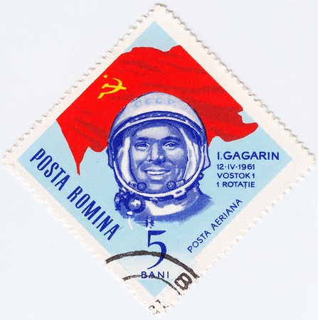 ROMANIA - CIRCA 1963 : stamp printed in Romania shows Russian astronaut Yuri Gagarin - first human...