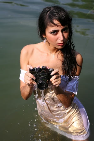 photographer in waterの写真素材