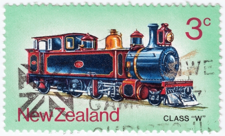 NEW ZEALAND - CIRCA 1973 : Stamp printed in New Zealand shows old train locomotive class W, circa 1973の写真素材