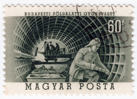 HUNGARY - CIRCA 1952 : Stamp printed in Hungary shows subway building, circa 1952 の写真素材