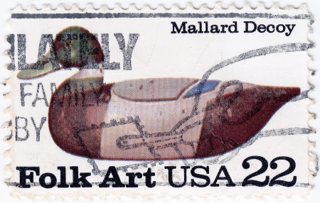USA - CIRCA 1977 : stamp printed in the USA shows Folk Art Mallard Decoy, circa 1977のeditorial素材
